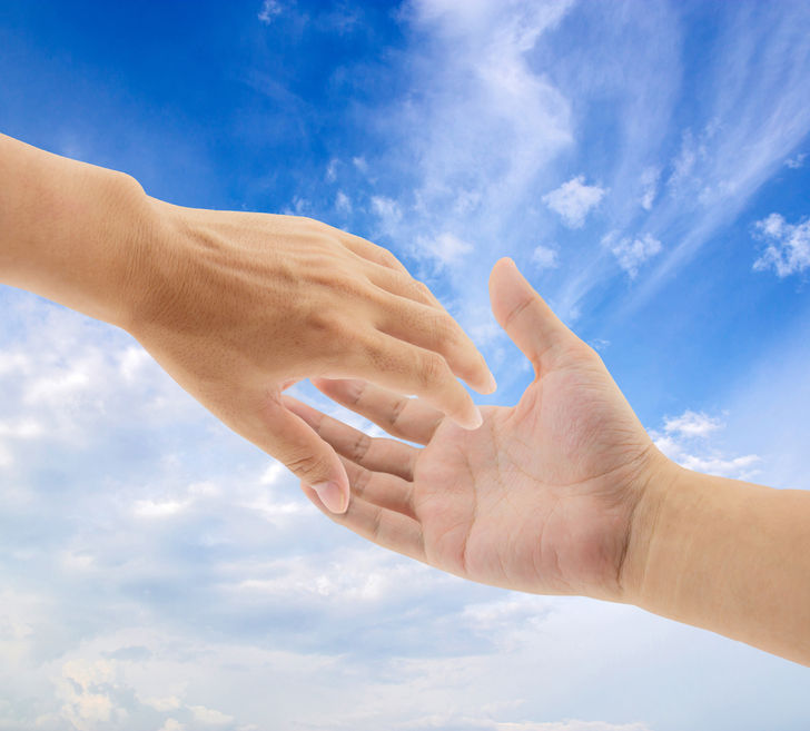 46736273 – helping hands on sky background