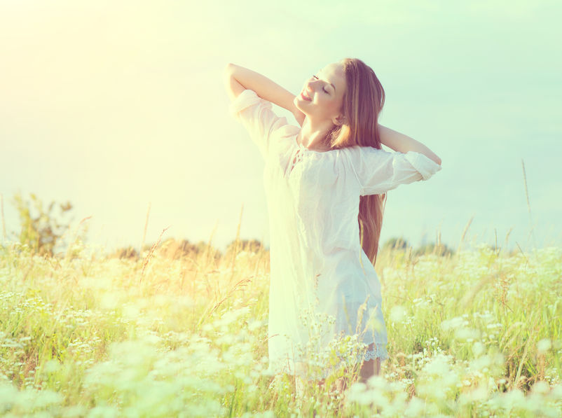 30436236 – beautiful teenage model girl in white dress enjoying nature
