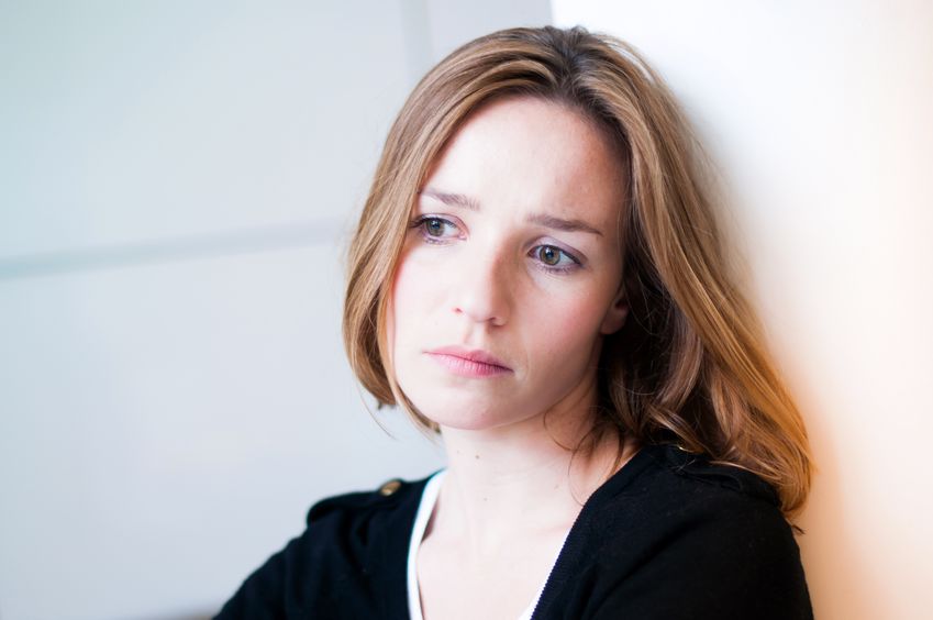 16272444 – depressed, sad woman in the living room